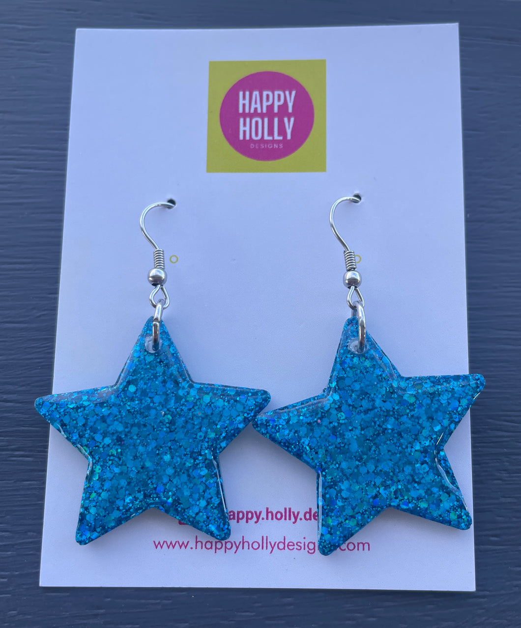Star dangle earrings - blue glitter star